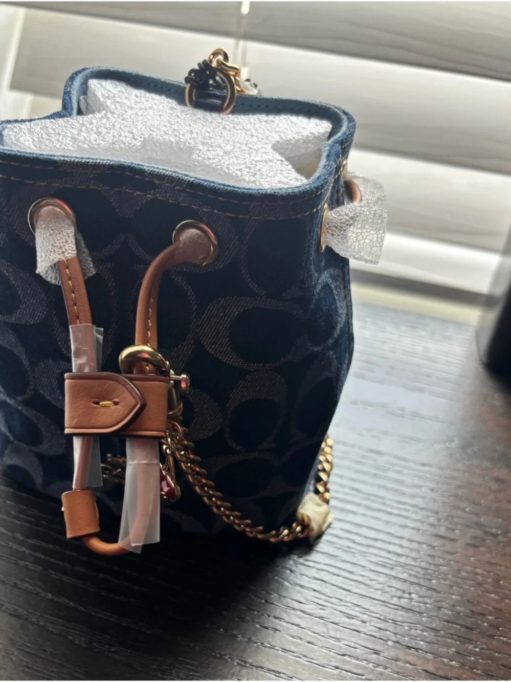Coach Signature Denim Drawstring Wristlet
Navy Mini Bucket Bag with Gold Chain - Picture 6 of 10